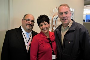 CIRI President and CEO Sophie Minich (center) and CIRI executive Greg Razo (left) greet Secretary Zinke during his visit to the Fireweed Business Center. Photo by Jason Moore.