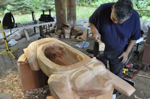 The Alaska Native Heritage Center is a prior TCF project  grant recipient. ANHC commissioned Tlingit master  woodcarver James Williams to carve the “Cracked  Frog,” bringing Tlingit tradition, culture and art into a  contemporary setting.