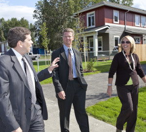U.S. Senator mark Begich, HUD Secretary Shaun Donovan and CIHA President/CEO Carol Gore tourisng the Mountain View community. Courtesy of Cook Inlet Housing Authority.