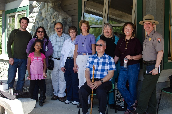 Dana Wright; Anna Erbeck and her granddaughter Alaina; Mike Harper and his wife Jane; Senator Lisa Murkowski; Esther Fast and  her brother Richard Fast (seated); Johanna Harper; and Superintendent Don Striker at the renaming ceremony.  Courtesy of Denali National Park and Preserve. 