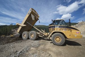 A dump truck unloads contaminated mile tailings at the Ninemile Waste Consolidation Area.