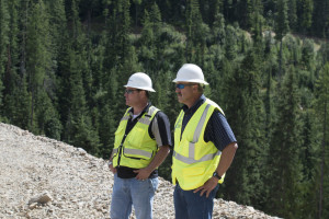 North Wind Safety Manager Woody Sweet (left) and Coeur d’Alene Trust Program Manager Dan Meyer survey work at the Ninemile Waste Consolidation Area.