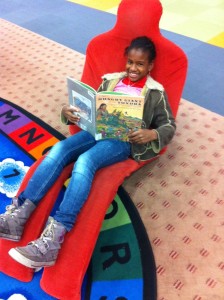 Little Sister Gina’s first visit to the Loussac Library with Big Sister and CIRI employee Rachel Batres. Printed with permission from BBBS. Courtesy of Rachel Batres.