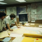 Kirk McGee and Carl Marrs study CIRI land selection maps in 1978.