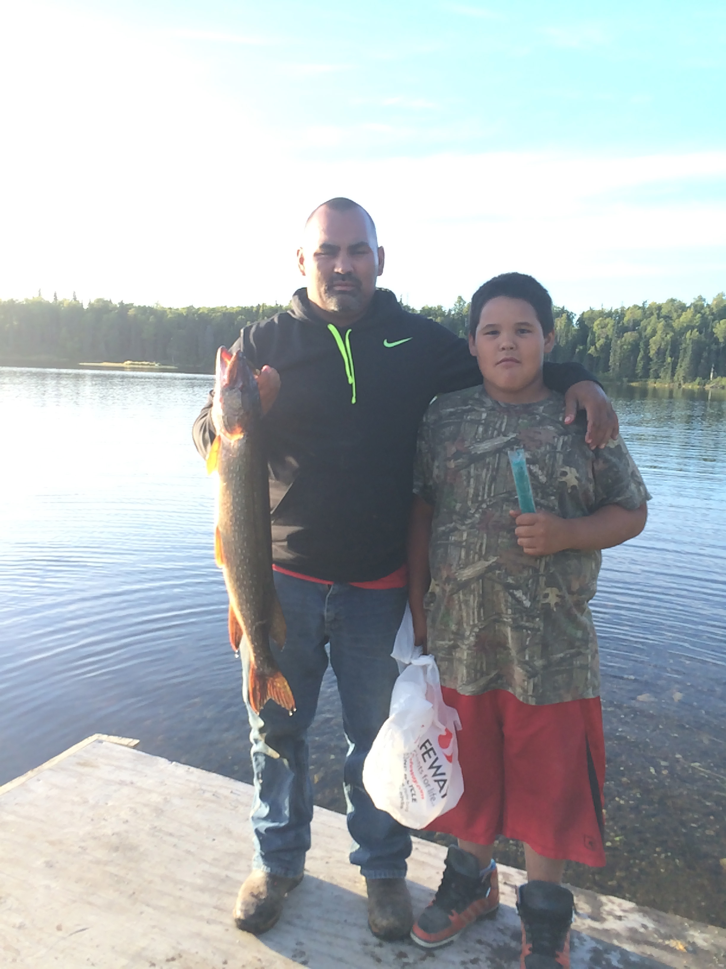 Rocky Standifer, right, won the Youth Participant prize in TTCD’s Summer Pike Derby. Courtesy of TTCD.