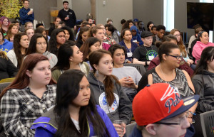 Color of Justice participants listening to opening remarks of the program.