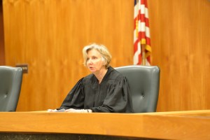 Former Chief Justice of the Alaska Supreme Court Dana Fabe welcomes the students to day two of Color of Justice in the Supreme Court chambers.