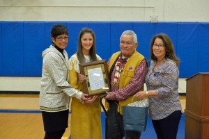 CIRI shareholder and 2015 Elder of the Year Albert Harrison accepted his award at the 2015 Friendship Potlatch in Anchorage with his daughter Jennifer Harrison. (Pictured left to right: CIRI President and CEO Sophie Minich, Jennifer Harrison, 2015 Elder of the Year Albert Harrison and CIRI Director Katrina Jacuk.)